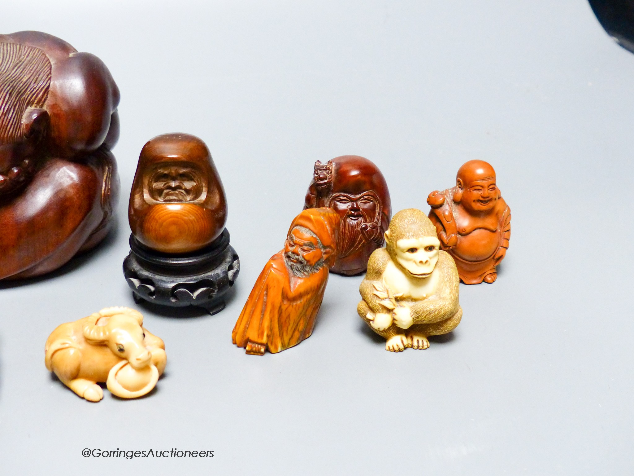 A collection of netsuke, and other carvings, tallest 10cm